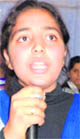 A girl sings a bhajan at SNMJN College in Haridwar on Tuesday. 