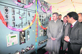 Chief Minister Omar Abdullah inaugurates a power grid station at Magam in Budgam district on Tuesday. 
