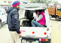 The accused being taken to a police station in Jagraon
