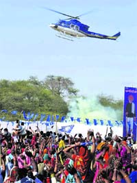 UP Chief Minister and BSP supremo Mayawati arrives in a helicopter for an election rally in Agra on Tuesday. 