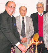 PTU V-C Dr Rajneesh Arora lights a ceremonial lamp in Ludhiana. 