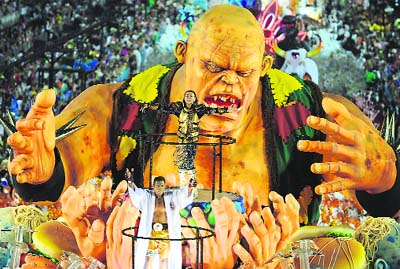 Revellers of Academicos do Grande Rio Samba School perform during the second night of Carnival in Rio de Janeiro on Tuesday.