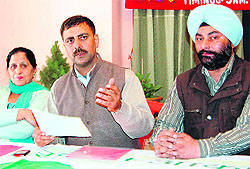 Deepak Babbar (middle), executive director of the Mission Agaaz, addresses mediapersons in Amritsar on Wednesday