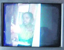 A CCTV grab shows the maid.