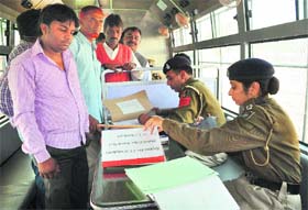 Residents of Colony no. 5 register their complaints at a mobile police station in Chandigarh on Wednesday. 