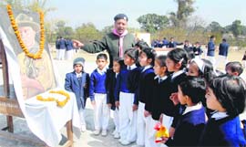 Students of Kendriya Vidyalaya being shown a photograph of Lord Baden Powell, the founder of Scouts and Guides, in Dehradun on Wednesday.