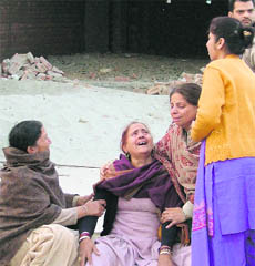 Grieving family members of Amandeep and Jyoti, who were killed in an accident, in Ludhiana on Wednesday. 