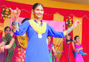 A girl performs a dance during a farewell function organised at New Secondary School in Ludhiana. 