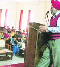 An official from the Ministry of Textile addresses a seminar on Indian handlooms at Malwa Central College, Ludhiana. 