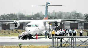 A file photo of the first commercial flight from Delhi that touched down at the Sahnewal Airpor near Ludhiana in April 2010. 