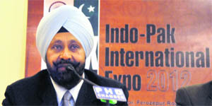 RS Sachdeva, co-chairman of PHD chamber, addresses a press conference in Ludhiana. 