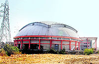 Power towers near an indoor stadium in Moga 