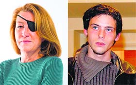 American war reporter Marie Colvin (L) and French photojournalist Remi Ochlik