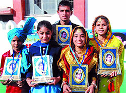 Winners of the singing contest held on at village Jaipalgarh on the eve of the beginning of Virasat Mela in Bathinda on Thursday