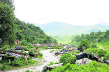 A slum colony on the banks of a river near Dehradun. 