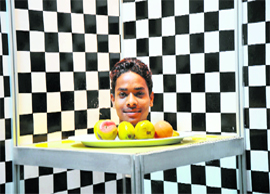 A boy peeps through a box at the Panorama Science Museum in Kurukshetra. 