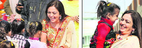 Nita Ambani interacts with children at Unique Home in Jalandhar on Thursday. 