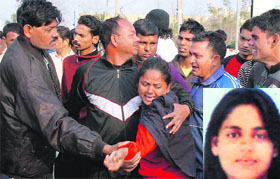 Inconsolable relatives of Preeti (inset) who was killed in an accident on the GT Road in Jalandhar on Thursday