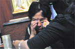 The victim, Anju Suri, in a state of shock in Ludhiana 