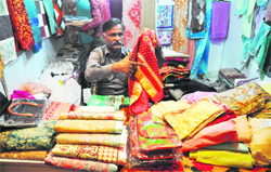 Dungro Mal displays his collection at the expo in Ludhiana.