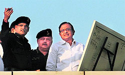 Union Home Minister P Chidambaram (C) is briefed by officials during the inauguration of the National Security Guards regional hub in Mumbai on Thursday