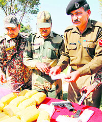 BSF personnel show the material seized from the shot smuggler