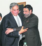 Commerce & Industry Minister Anand Sharma (R) with industrialist Ratan Tata during the first meeting of the reconstituted National Manufacturing Competitiveness Council (NMCC) in New Delhi on Friday. 