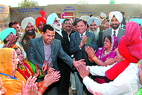 Bathinda Deputy Commissioner KK Yadav and District and Sessions judge SK Aggarwal dance to the beat of Punjabi dhol on the inaugural day of the Virasat Mela that began in Bathinda on Friday.