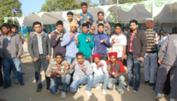 Winning students pose with their medals on the concluding day of the athletic meet at the Punjab Technical University Giani Zail Singh campus in Bathinda 