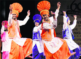 Artistes perform bhangra at the diamond jubilee celebrations of the ESIC at Tagore Theatre, Sector 18, Chandigarh, on Friday