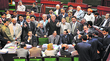 PDP legislators raise slogans demanding an adjournment motion in the Assembly