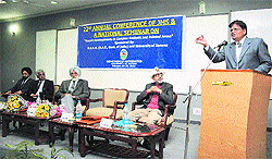 Noted mathematician Prof Satya Deo Tripathi from Harish Chandra Institute, Allahabad, delivers a keynote address during the 22nd annual conference of the Jammu Mathematical Society in the University of Jammu on Friday.