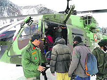 Rescued civilians being taken to safer grounds on Friday. 