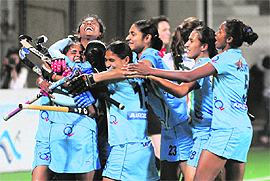 Indian womens team celebrate after winning their match against Italy during the FIH London 2012 Olympic 