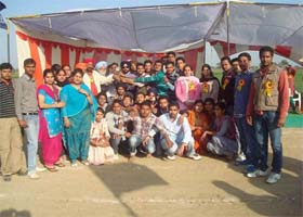 Winning students pose with teachers at the felicitation ceremony of the GRDIET athletic meet in Bathinda on Friday