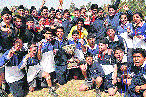 Students in a jubilant mood with their athletics meet trophy at the Yadavindra Public School in Mohali on Saturday
