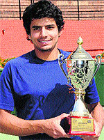 Sanam with his trophy