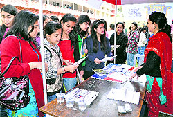 Students visit a counter at the MCMDAV College in Sector 36 of Chandigarh on Saturday
