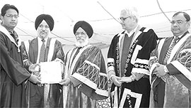 Dr Surjit Patar confers degrees to a student during the annual convocation of Khalsa College at Patiala on Sunday
