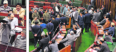 An infuriated PDP MLA, Muzaffar Hussain Beigh, leaves his seat after Speakers intervention; and (right) party MLAs stage a walkout from the Legislative Assembly in Jammu on Saturday