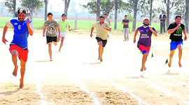 Athletes take part in a race at Government College, Karamsar, Ahmedgarh. 