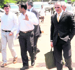 Italian arms experts on their way to merchant vessel Enrica Lexie in Kochi on Saturday. 