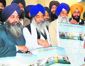 Jathedar Giani Gurbachan Singh releases the amended Nanakshahi calendar in Amritsar. 