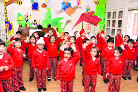 Tiny tots sing nursery rhymes at Strawberry Fields Kindergarten.