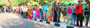 A long queue of visitors can be seen outside the venue at Sector 16 in Chandigarh on Sunday.