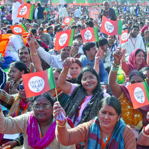 BJP supporters at the party's 'Vijoy Sankalp Divas' celebrations at the Ramlila Ground in New Delhi on Sunday.