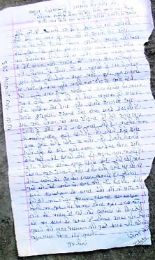 A suicide note lying on the floor