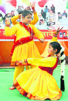 Children give a performance during the Holi celebrations organised by the Kurmanchal Association.