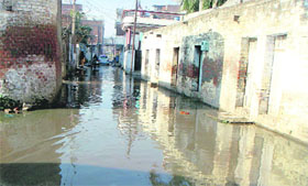 Sewer water accumulated on a street in Doraha.