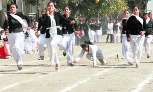 Girls of the Ramgarhia Girls College, Ludhiana, take part in the 100m race during the annual athletics meet on the college premises. 